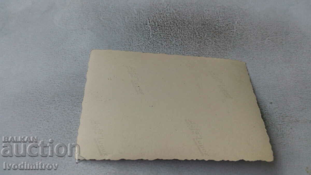 Photo Adult man woman and girl on the lawn with price 1.45 BGN | € 0.74 Photo Adult man woman and girl on the lawn with price 1.45 BGN | € 0.74