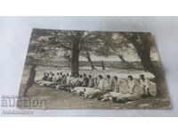 Photo Young girls do physical exercises in class