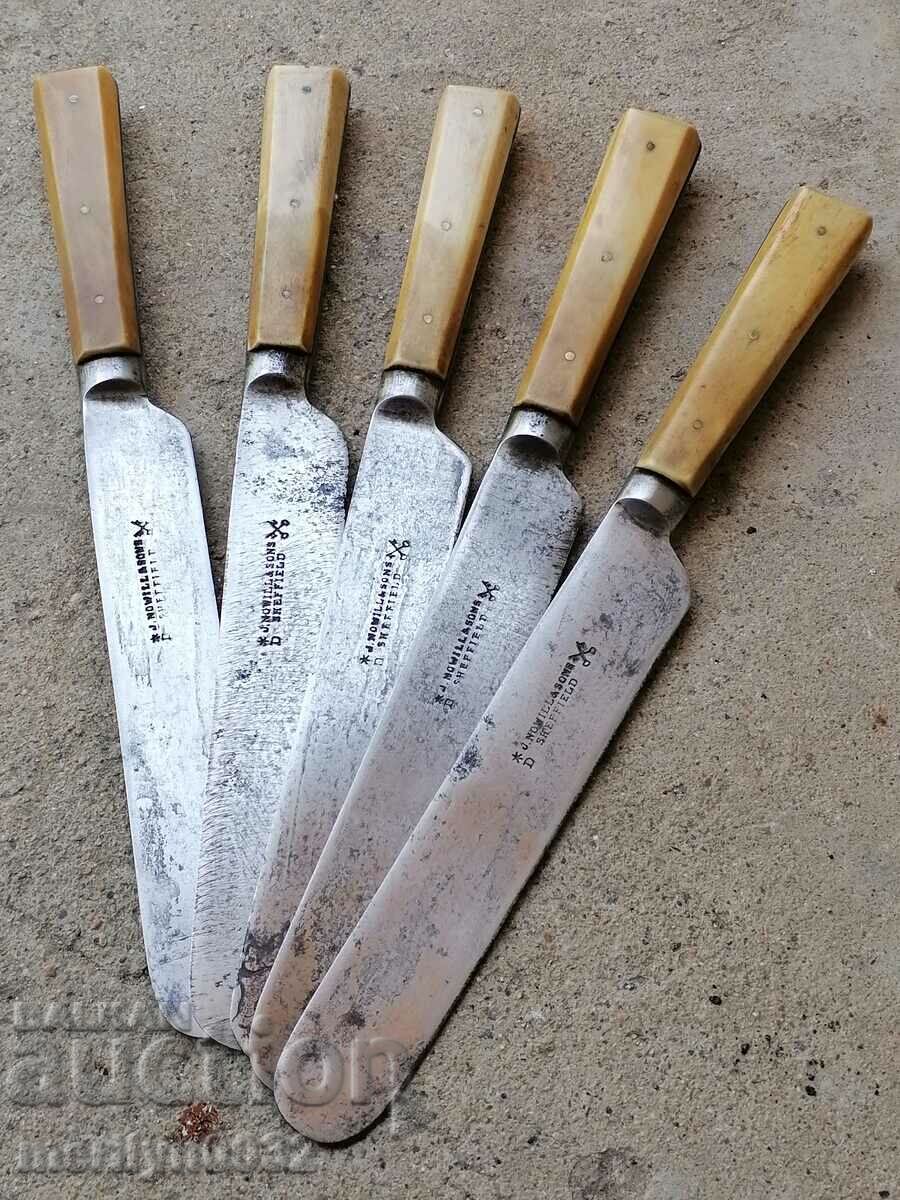 Old knives with a bone handle