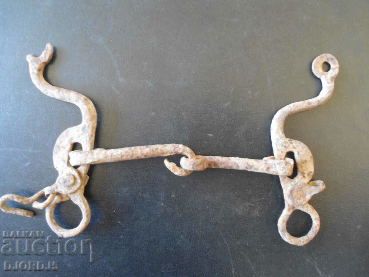 Auction Old wrought iron bridle, interior Auction Old wrought iron bridle, interior