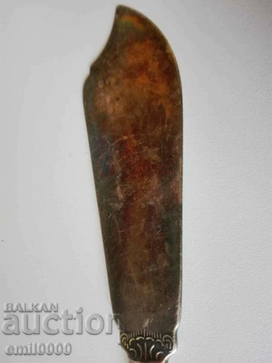 Auction  Silver plated knife.