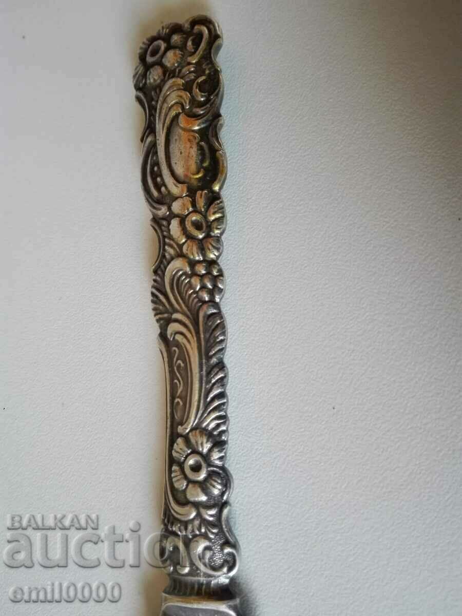 Silver plated knife. - 5