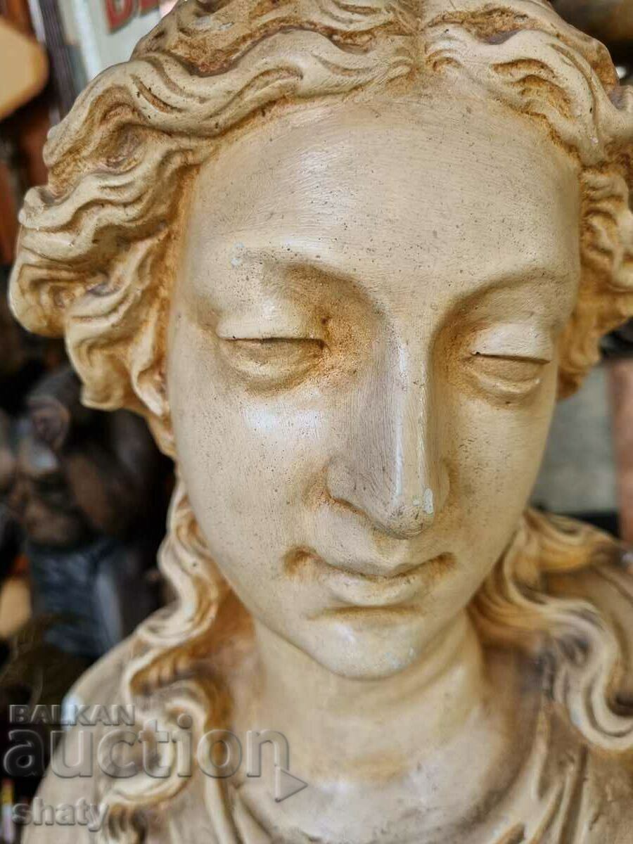 An old statue. Ancient figure - 5