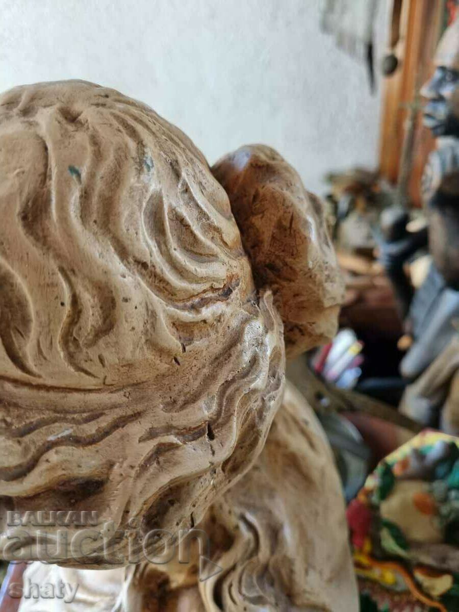 An old statue. Ancient figure - 7