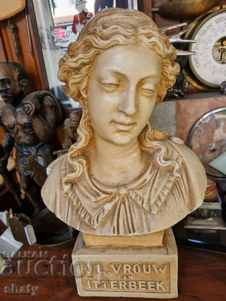 An old statue. Ancient figure
