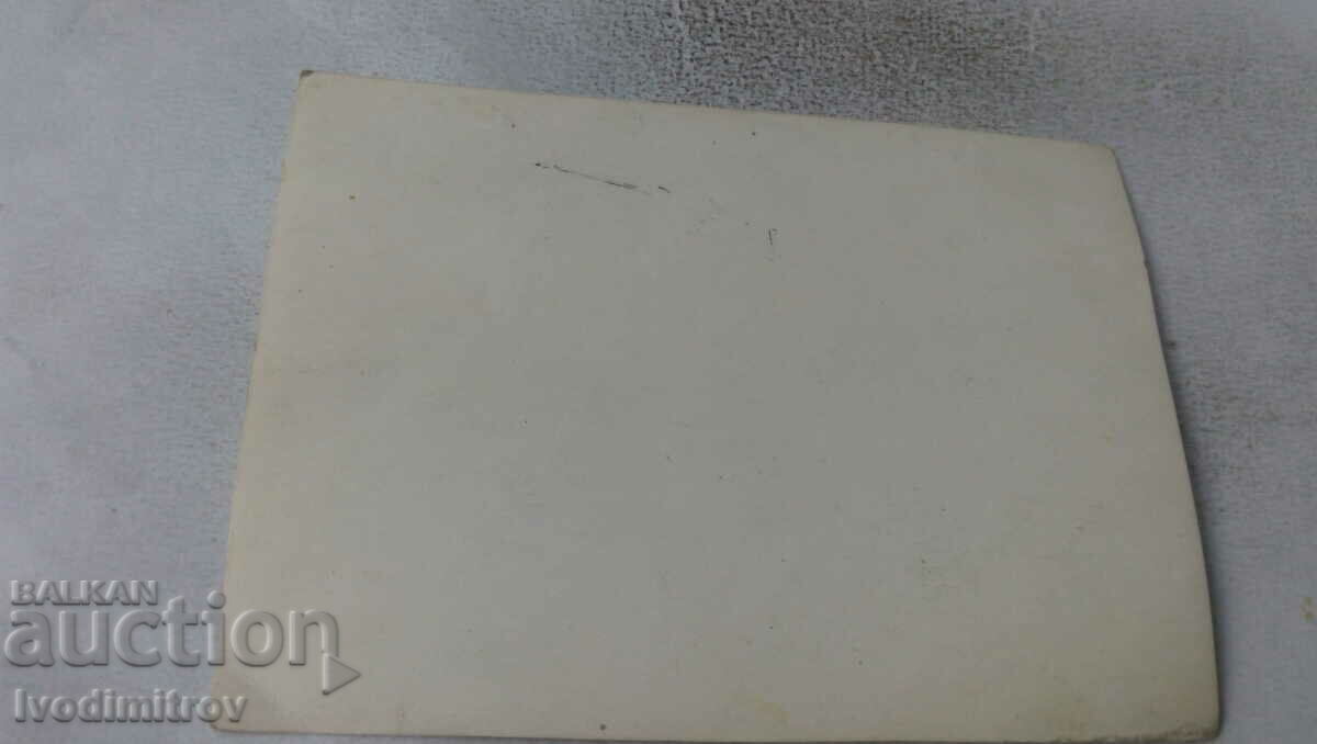 Photo Woman and two men on the beach with price 2.45 BGN | € 1.25 Photo Woman and two men on the beach with price 2.45 BGN | € 1.25