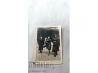 Photo Sofia Officer and two women in front of Balkan Hotel