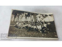 Photo Men and women on a picnic