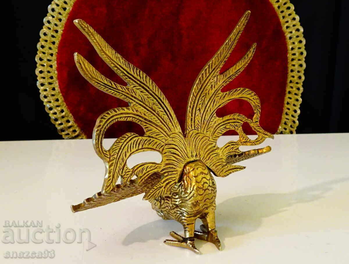 Delivery of Bronze statuette Rooster with ruby eyes.
