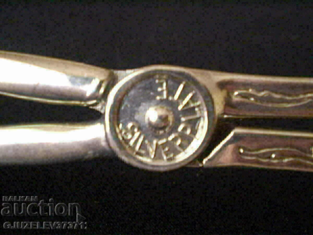 Delivery of Silver-plated tongs for serving dishes