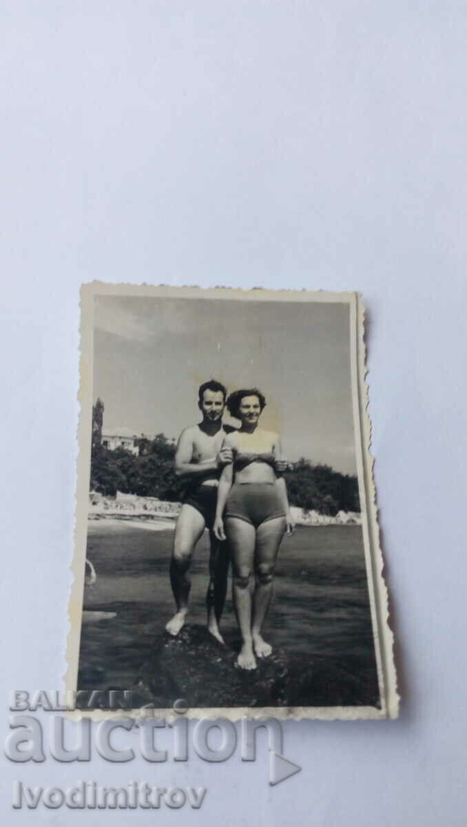 Φωτογραφία Άνδρας και γυναίκα στη θάλασσα