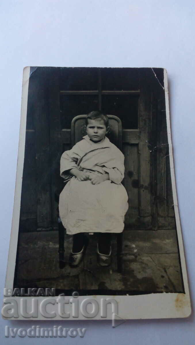 Photo Little girl on a chair