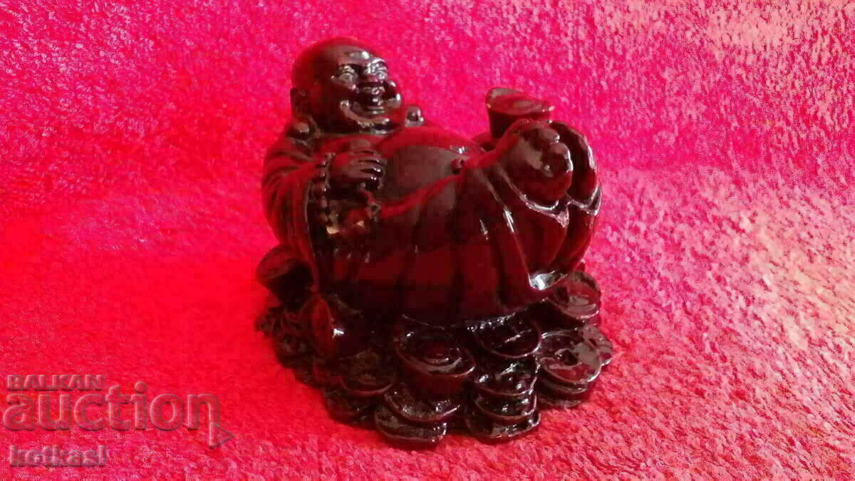 Buddha is a solid massive figure