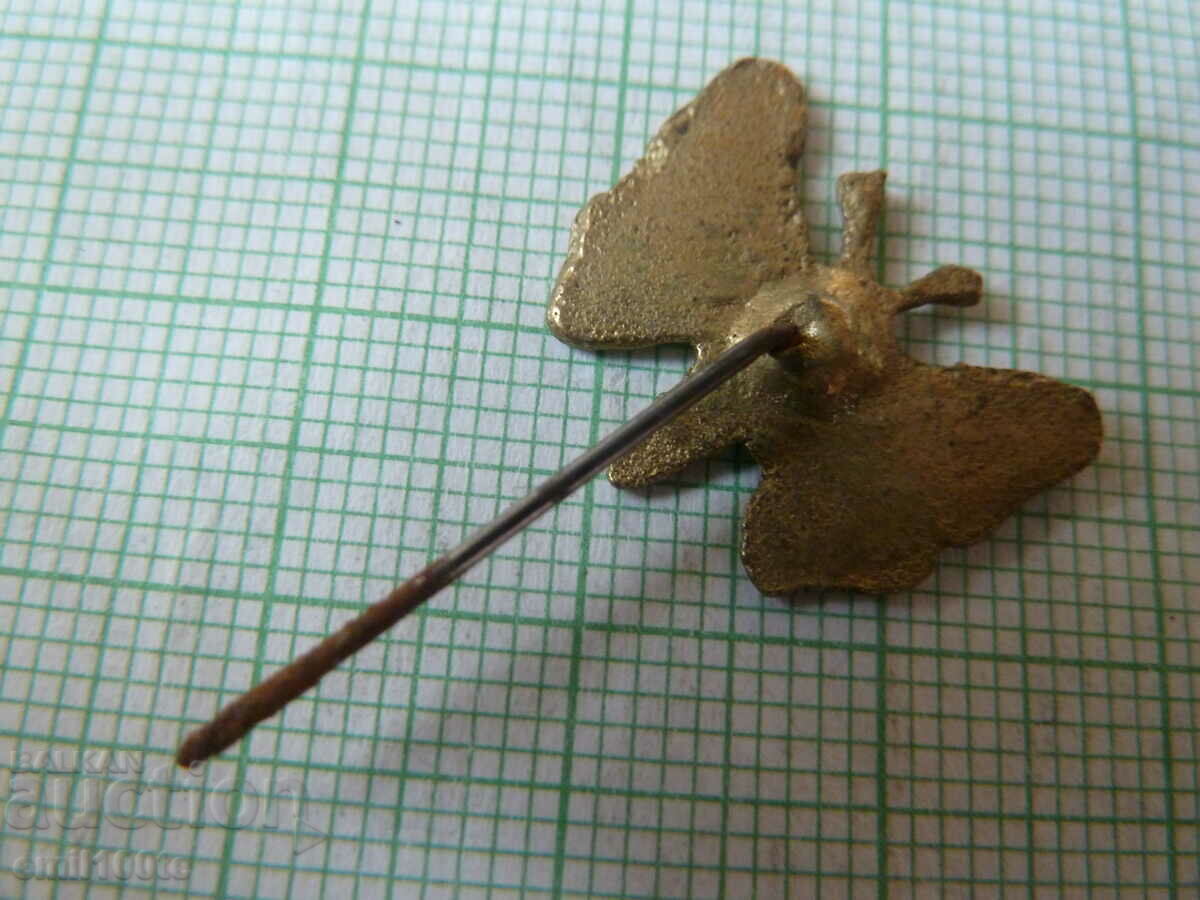 Delivery of Old bronze badge - Butterfly Delivery of Old bronze badge - Butterfly