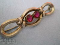 Silver brooch with rubies art deco 1930