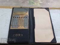 Old pocket mechanical calculator Obra