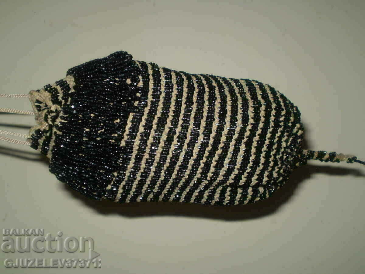 Delivery of Old purse - a pound of black glass beads
