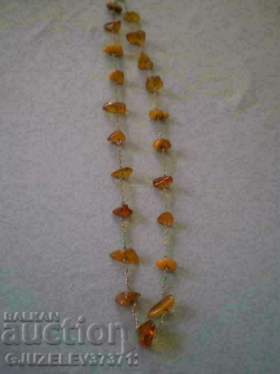 Vintage necklace of natural amber and silver with price 199.00 BGN | € 101.75 Vintage necklace of natural amber and silver with price 199.00 BGN | € 101.75