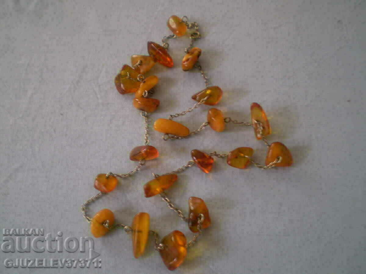 Vintage necklace of natural amber and silver