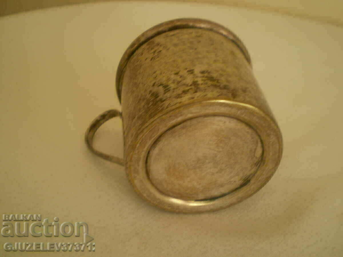 Delivery of Old silver-plated German milk jug, tea marked