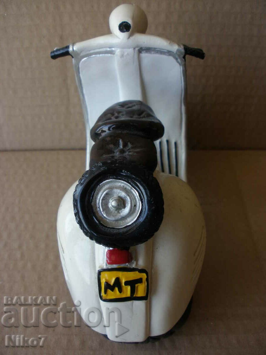 Delivery of Vespa moped - scale model.