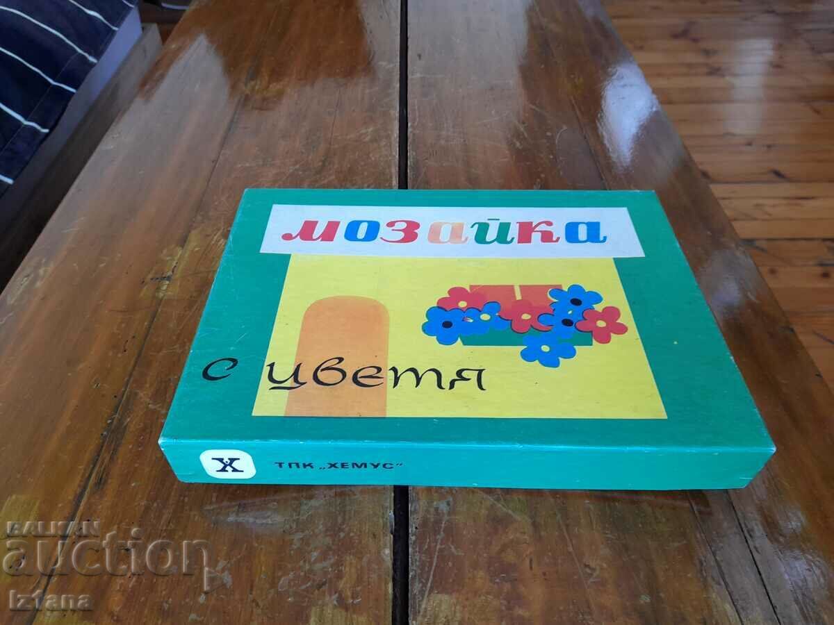 Old children's game Mosaic with flowers Old children's game Mosaic with flowers