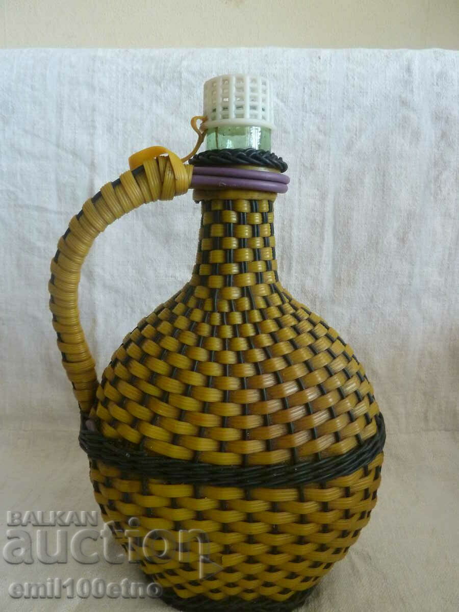 Bottle - damajana with braid with price 12.00 BGN | € 6.14 Bottle - damajana with braid with price 12.00 BGN | € 6.14