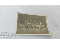 Photo Soldiers on a rock in the mountains
