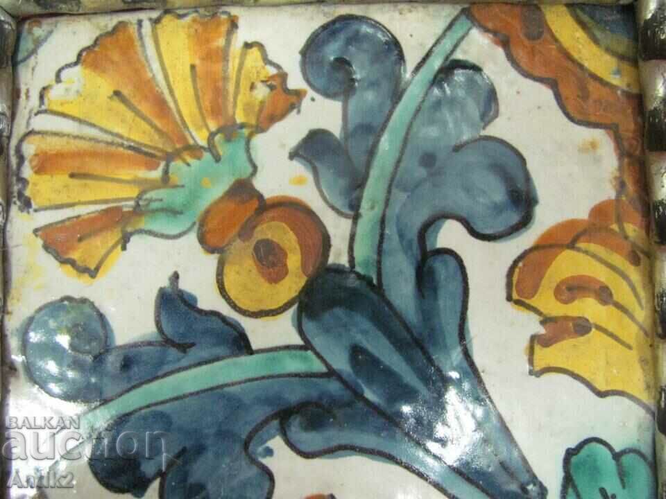 17c Antique Spanish Mayolica tile with stylized carnation with price 250.00 BGN | € 127.82 17c Antique Spanish Mayolica tile with stylized carnation with price 250.00 BGN | € 127.82