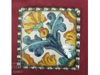 17c Antique Spanish Mayolica tile with stylized carnation