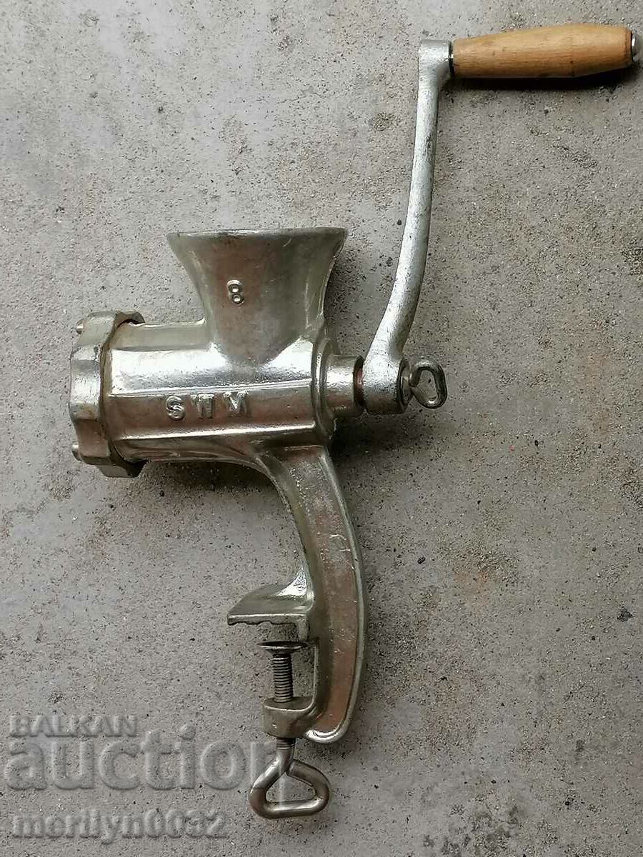 Auction An old metal grinder for meat grinders Auction An old metal grinder for meat grinders