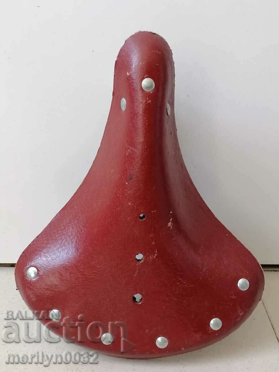 Auction  Old leather bike seat, bike