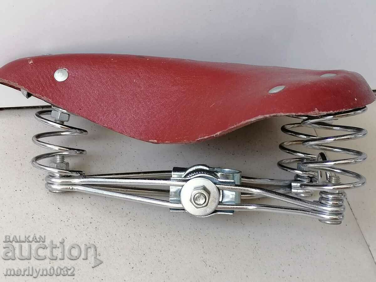 Old leather bike seat, bike