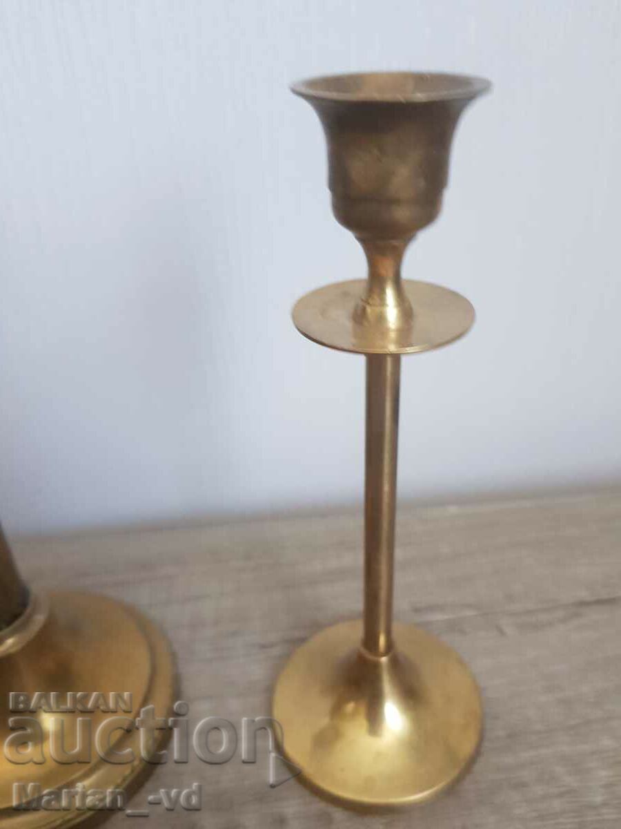 Auction Two old bronze candlesticks Auction Two old bronze candlesticks