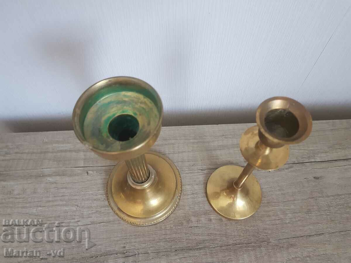 Delivery of Two old bronze candlesticks Delivery of Two old bronze candlesticks