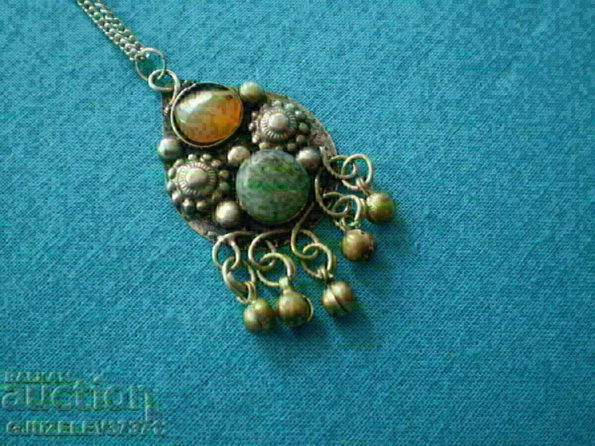 Auction women's medallion made of natural stones and sachan Auction women's medallion made of natural stones and sachan