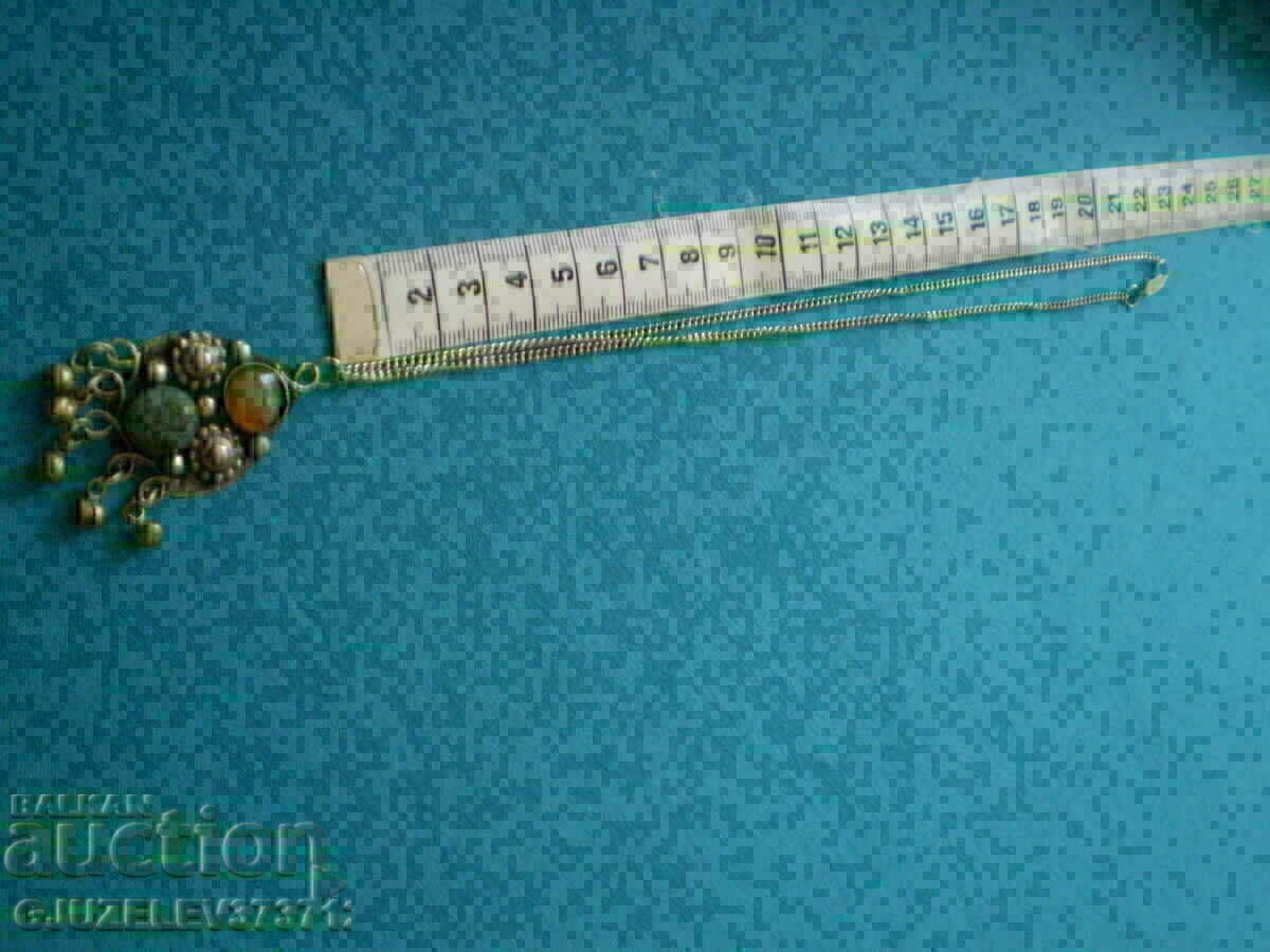 Delivery of women's medallion made of natural stones and sachan Delivery of women's medallion made of natural stones and sachan