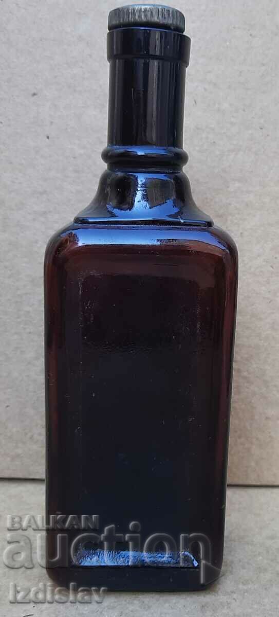 Antique bottle part of a collection Antique bottle part of a collection