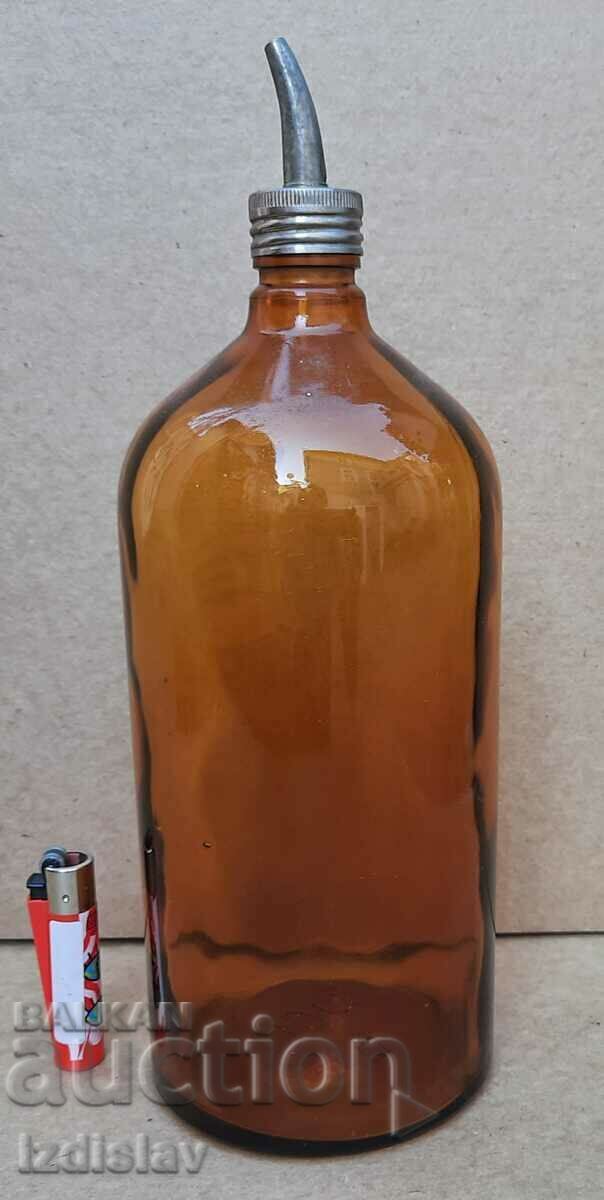Antique amber glass bottle part of a collection