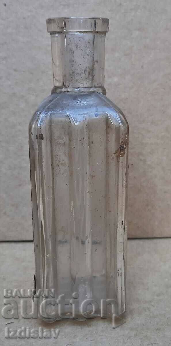 Auction Antique bottle part of a collection Auction Antique bottle part of a collection