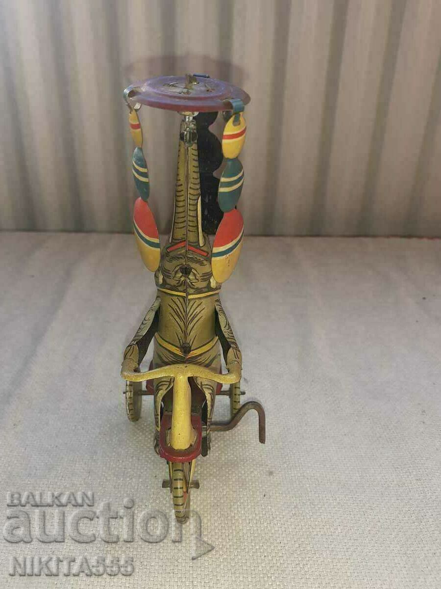 Rare tin toy - Elephant on Bike Tricycle with price 155.00 BGN | € 79.25 Rare tin toy - Elephant on Bike Tricycle with price 155.00 BGN | € 79.25