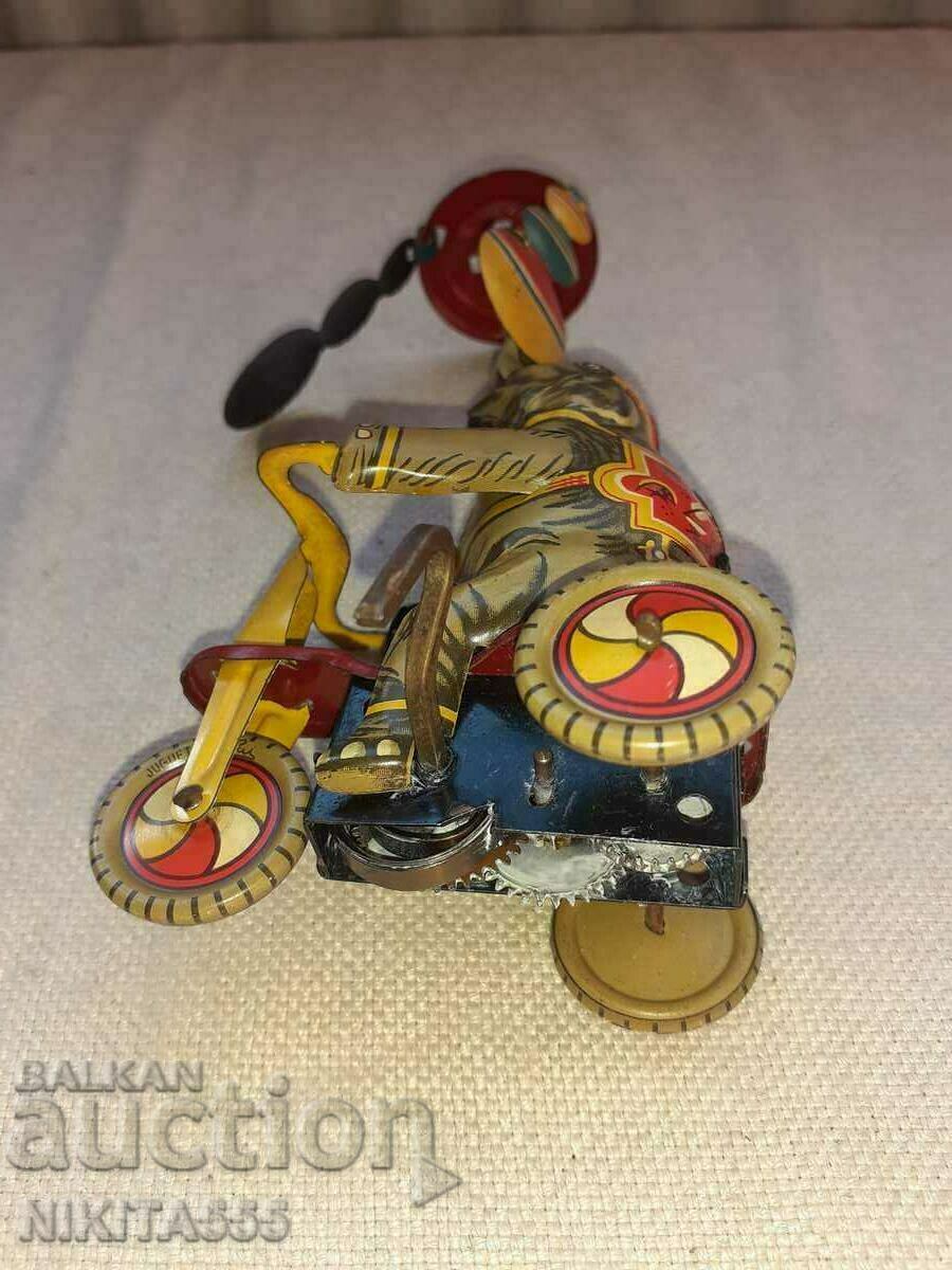 Delivery of Rare tin toy - Elephant on Bike Tricycle Delivery of Rare tin toy - Elephant on Bike Tricycle