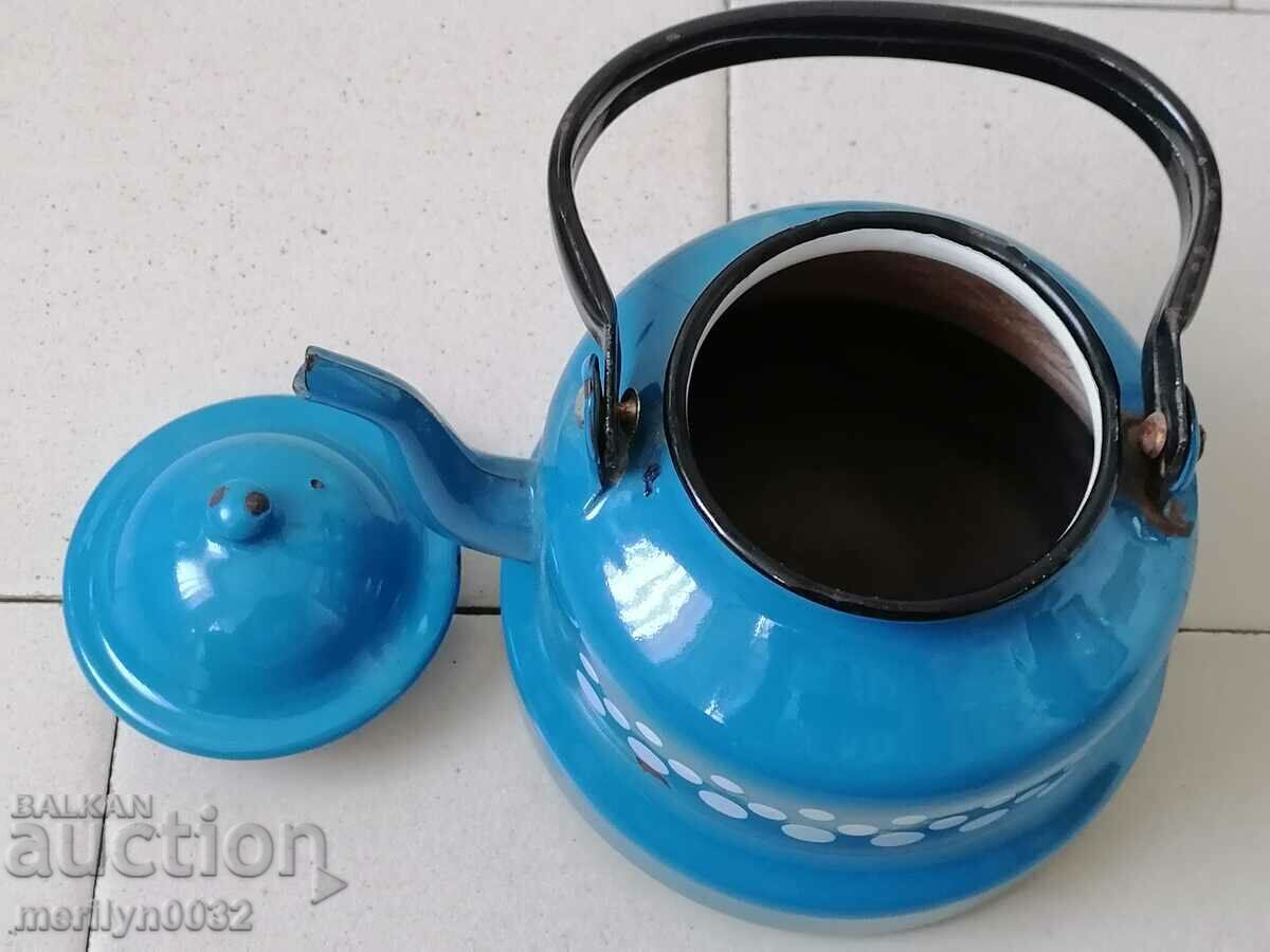 Delivery of Enameled teapot from the saucepan with enamel coffee pot Delivery of Enameled teapot from the saucepan with enamel coffee pot