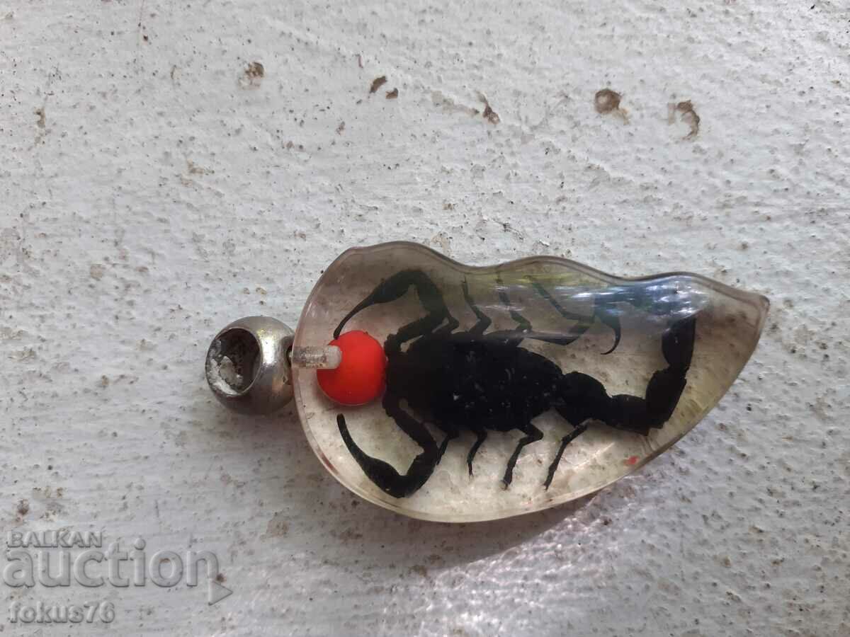 Delivery of Scorpion locket
