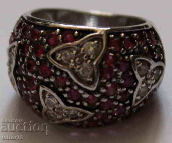 Масивен сребърен пръстен обсипан с натурални рубини и циркон с цена € 219.99 | 430.26 лв. Масивен сребърен пръстен обсипан с натурални рубини и циркон с цена € 219.99 | 430.26 лв.