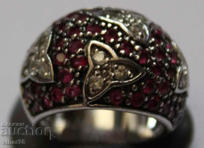 Delivery of Solid silver ring studded with natural rubies and zircon Delivery of Solid silver ring studded with natural rubies and zircon