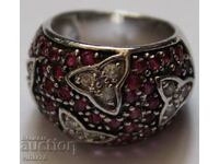 Solid silver ring studded with natural rubies and zircon