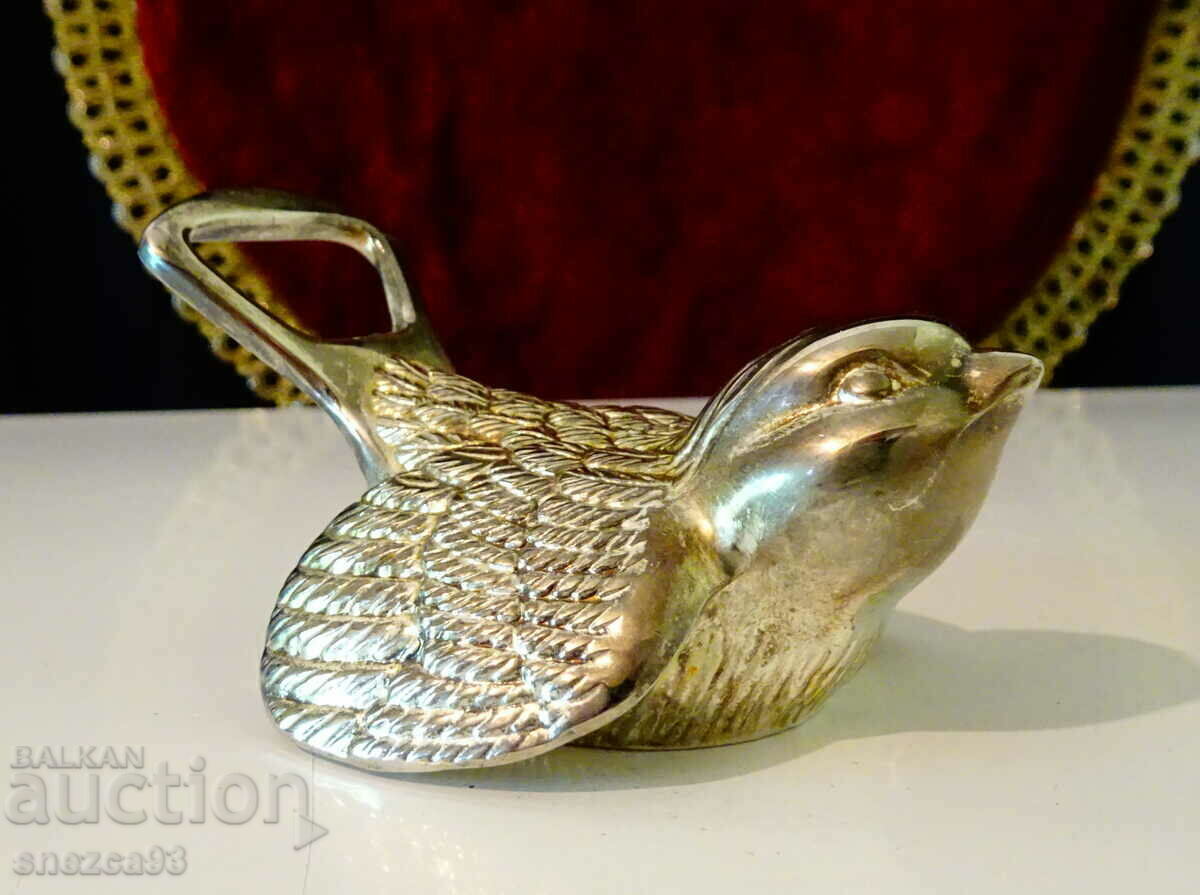 Silver-plated opener and closure Bird.