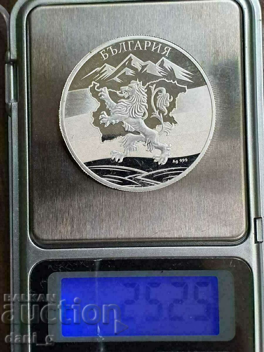 monedă de argint 999