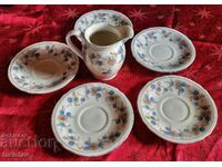 Cream jug and five plates